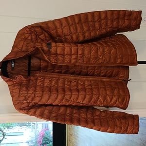 North Face copper colored insulated jacket